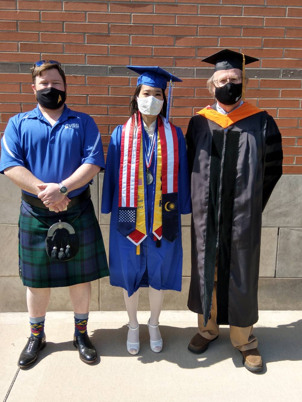 Dr. Baine and Dr. Dunne with an engineering graduate